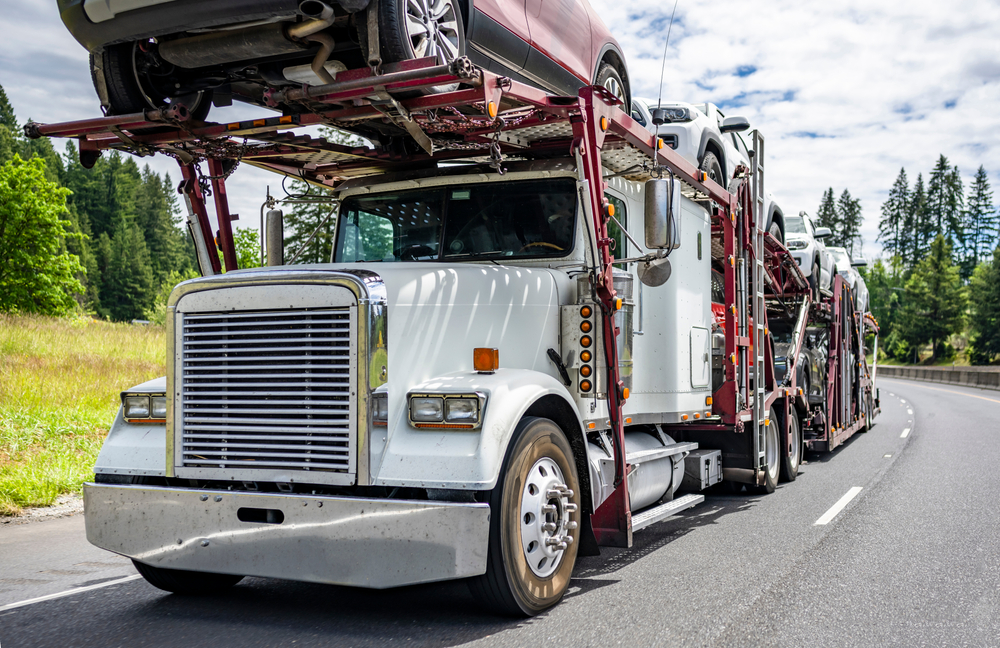 car shipping hauler truck with vehicles