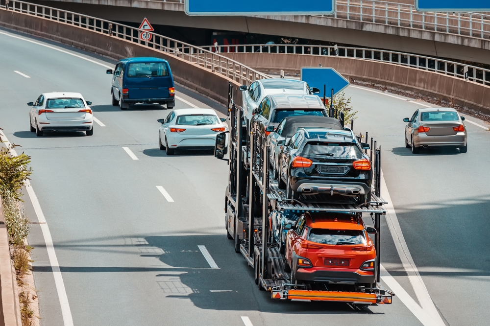 New York to California car shipping truck with cars